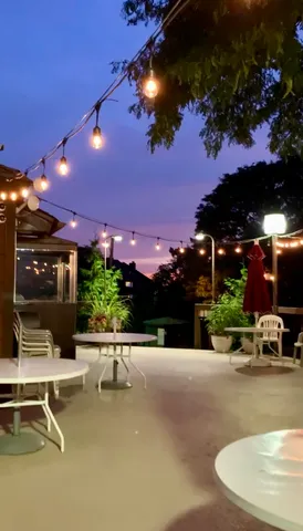 a view of a patio with swimming pool table and chairs