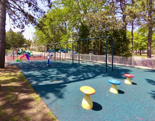 a view of a park with swings