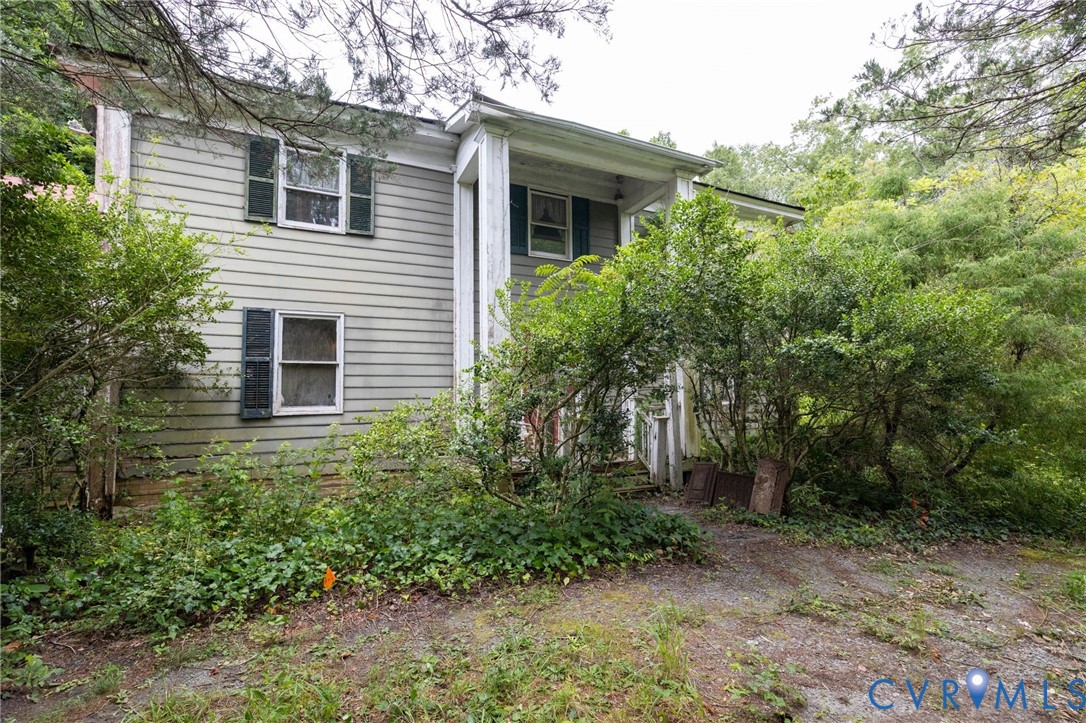 1407 Borden Road Bumpass, VA 23024 - Photo 1 of 1 a view of a house with a yard