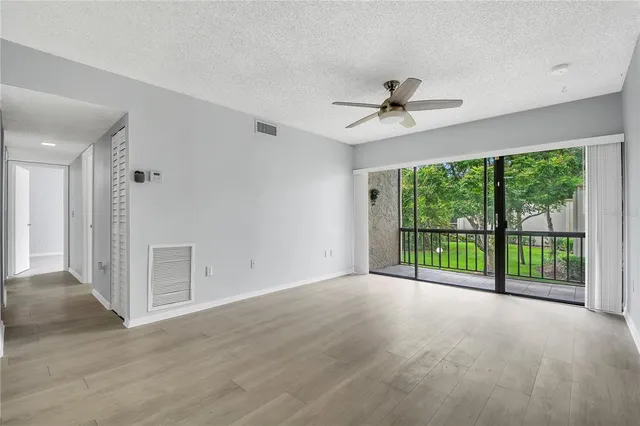 a view of a room with a large window
