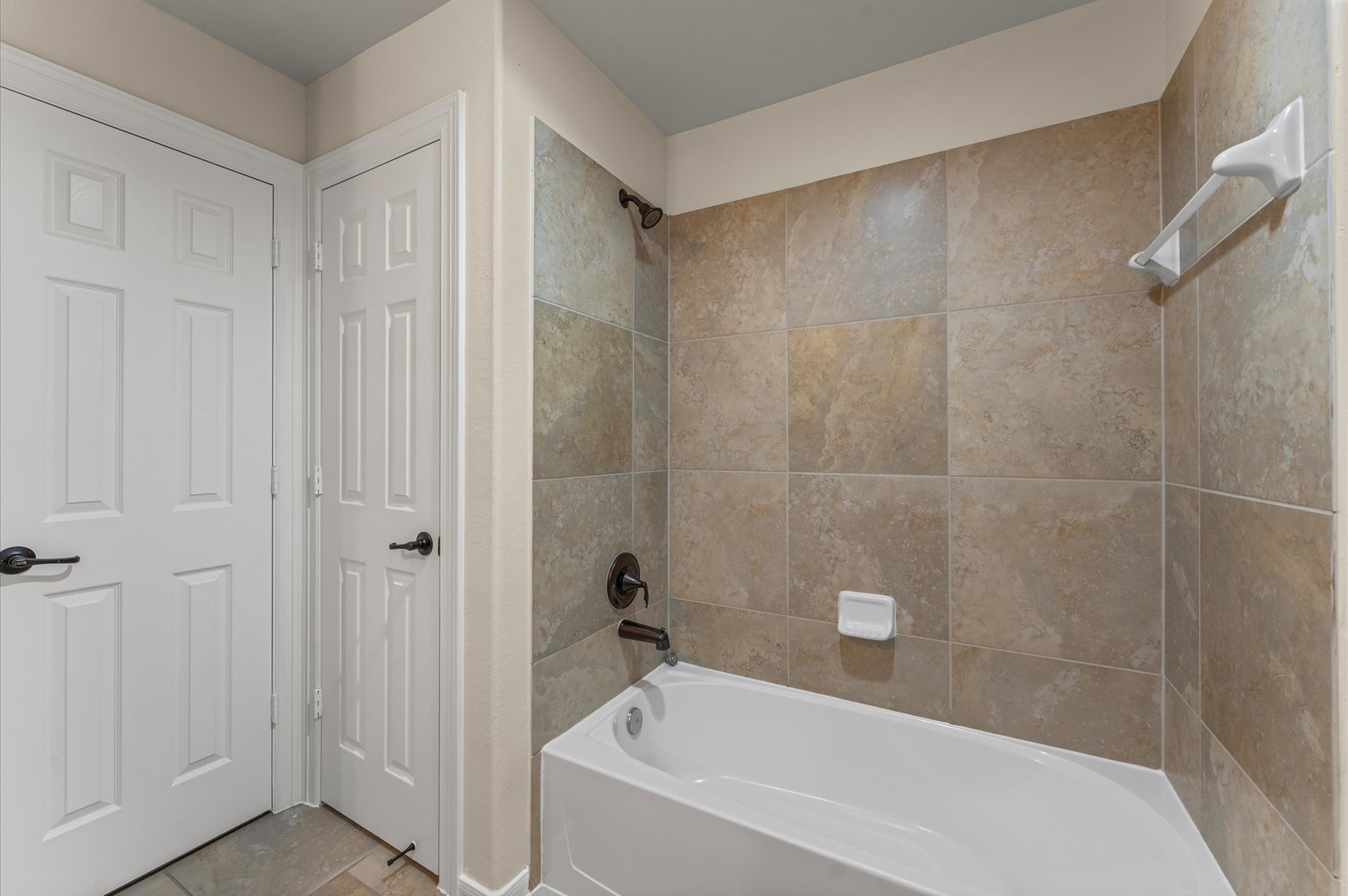 7 North Beech Springs Circle Spring, TX 77389 - Photo 43 of 50 a bathroom with a bathtub and shower
