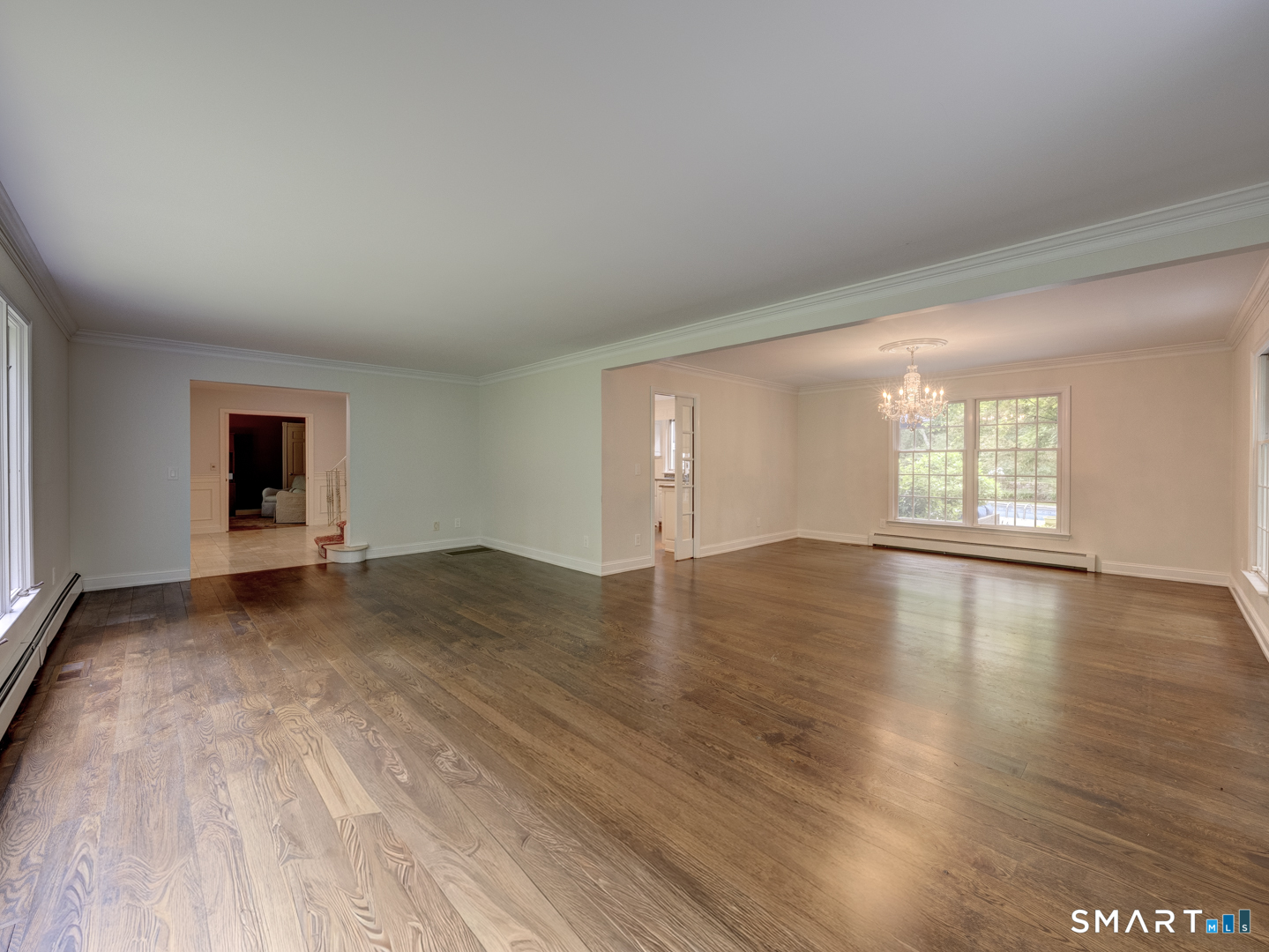 78 Windtree Street Torrington, CT 06790 - Photo 23 of 40 a view of empty room with wooden floor and fan