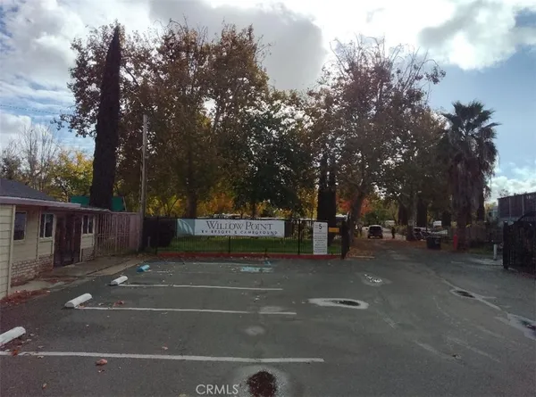a view of a street with houses on both side