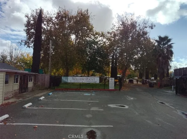 a view of a street with houses on both side