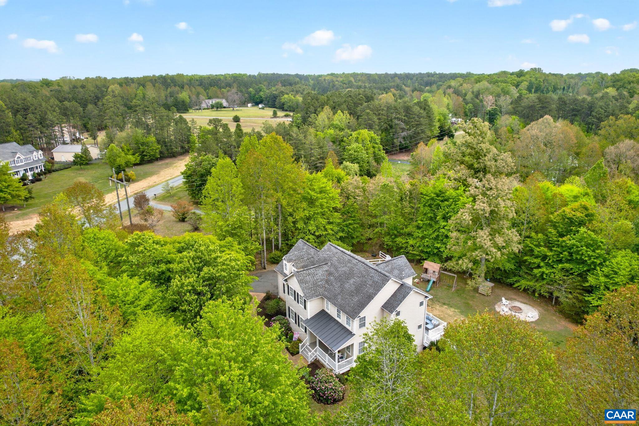 511 Taylor Ridge Way Palmyra, VA 22963 - Photo 54 of 57 an aerial view of residential house with outdoor space and trees all around