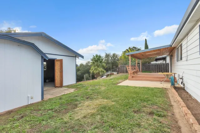 a house with yard in front of it