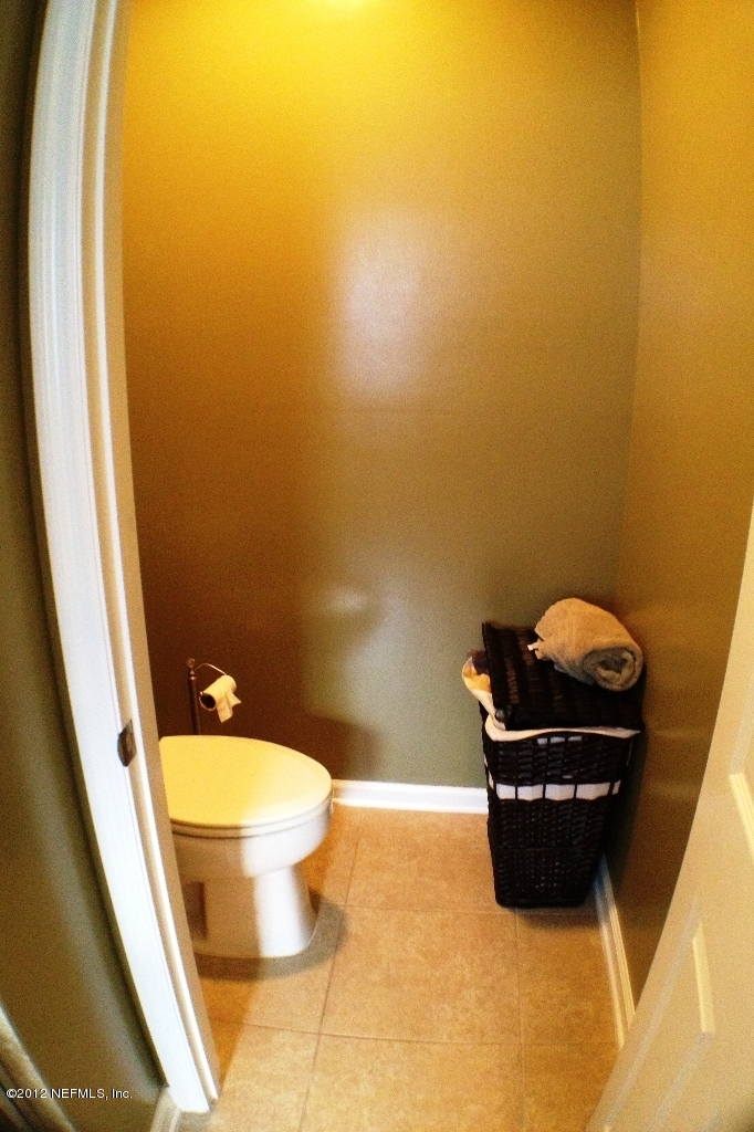 6092 White Tip Road Jacksonville, FL 32258 - Photo 15 of 32 a bathroom with a sink and a toilet