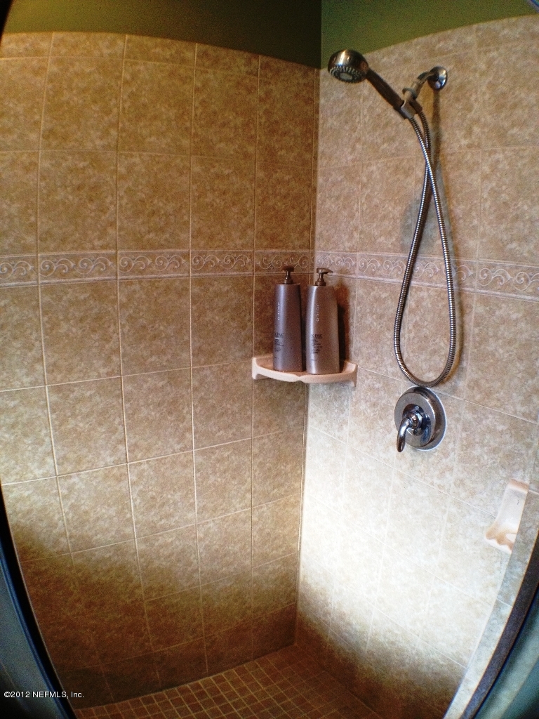 6092 White Tip Road Jacksonville, FL 32258 - Photo 16 of 32 a bathroom with a shower