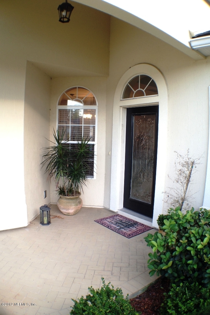 6092 White Tip Road Jacksonville, FL 32258 - Photo 6 of 32 a front view of a house with a yard