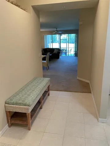 a living room with furniture and a couch