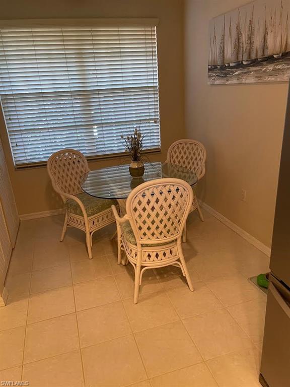 8085 Celeste Drive, Unit 812 Naples, FL 34113 - Photo 9 of 9 a view of a room with lounge chair