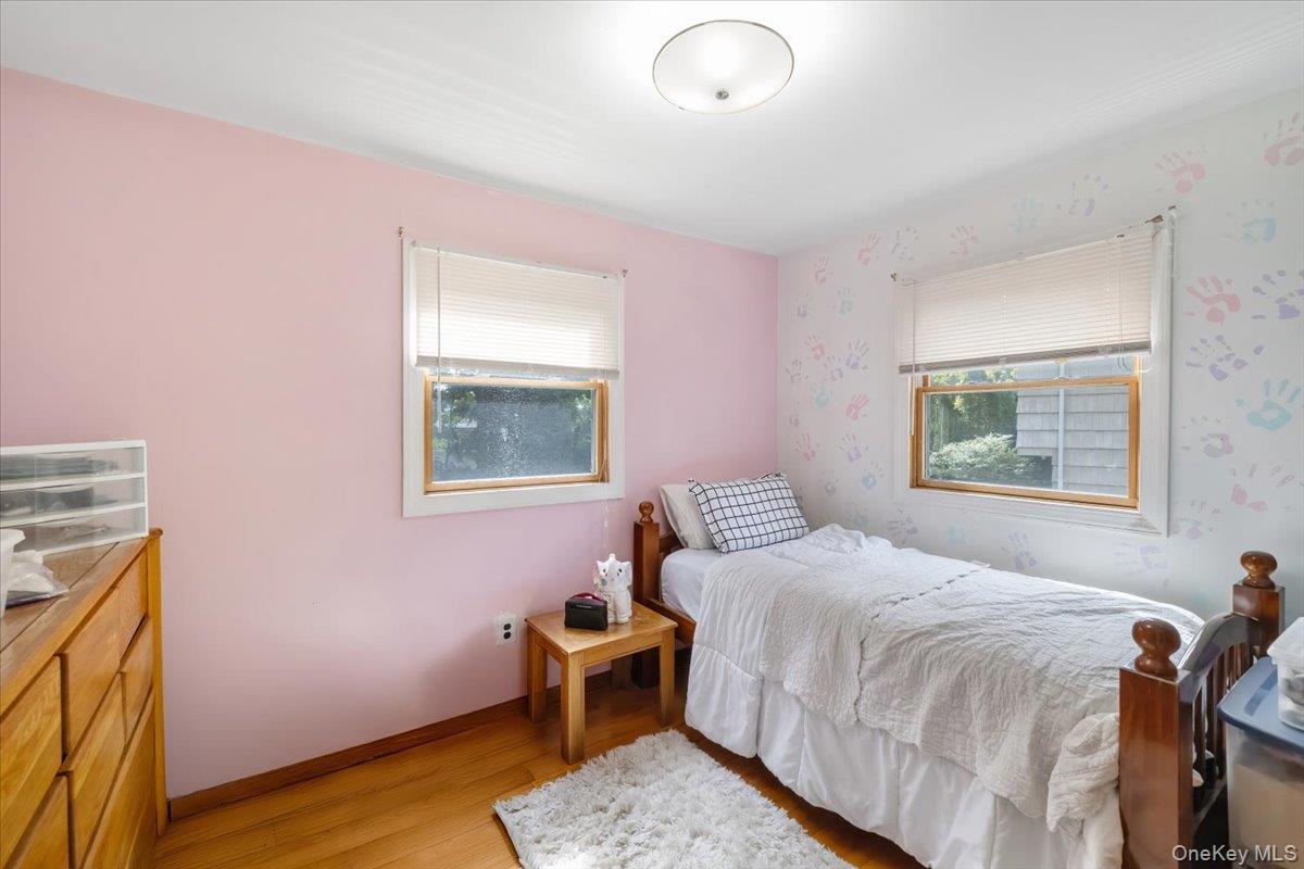 1 Interstate Street Suffern, NY 10901 - Photo 18 of 29 a bedroom with a bed and wooden floor