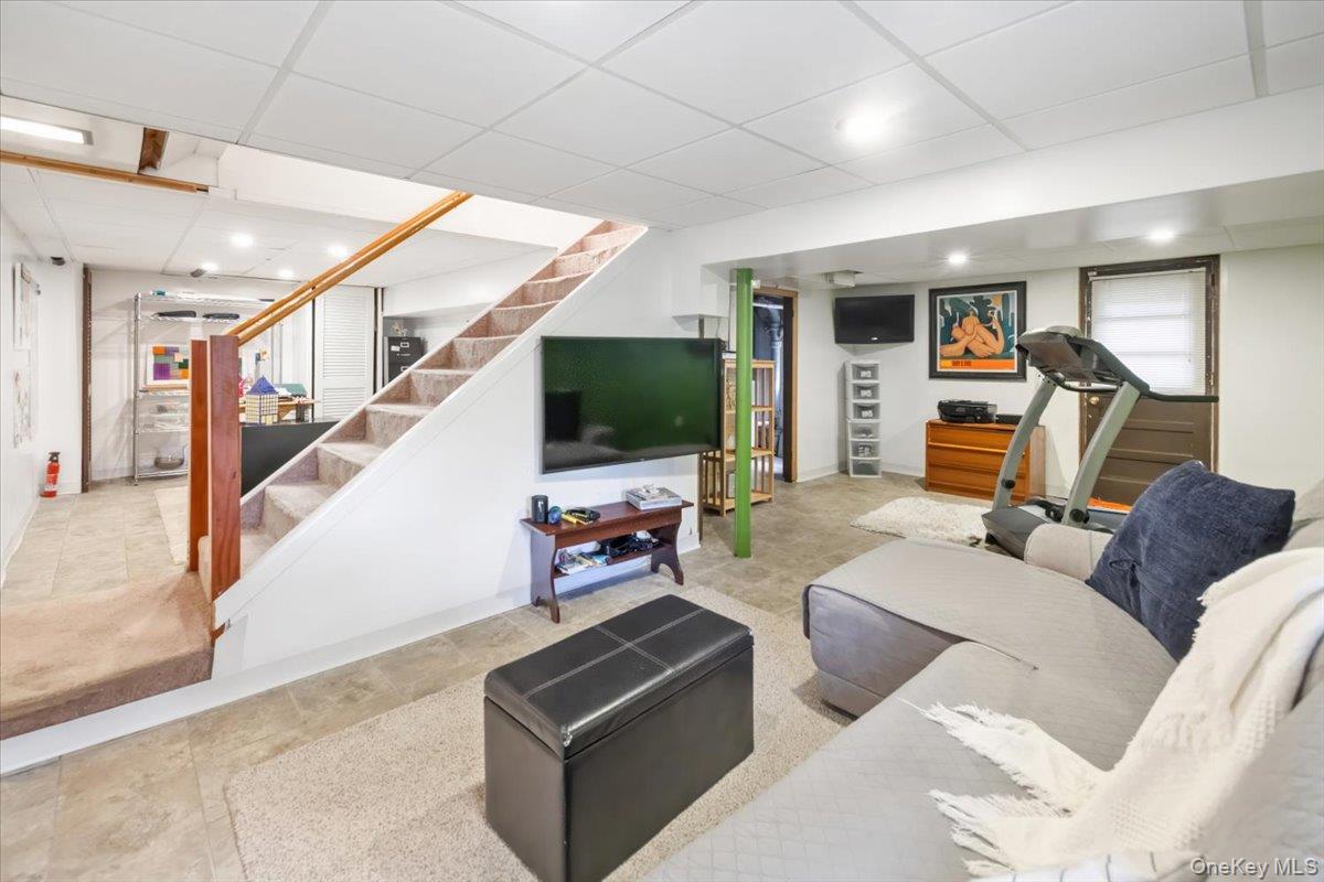 1 Interstate Street Suffern, NY 10901 - Photo 24 of 29 a living room with furniture and a flat screen tv