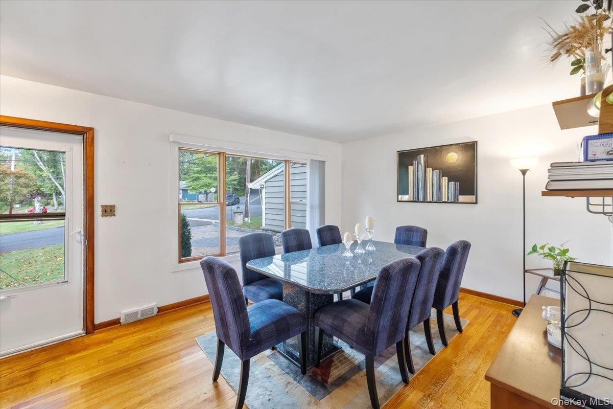 1 Interstate Street Suffern, NY 10901 - Photo 7 of 29 a view of a dining room with furniture and wooden floor
