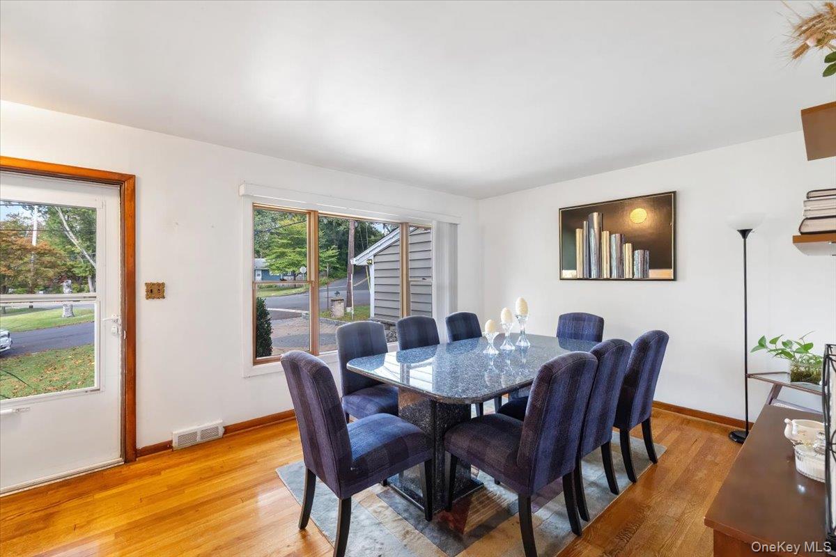 1 Interstate Street Suffern, NY 10901 - Photo 8 of 29 a view of a dining room with furniture window and wooden floor