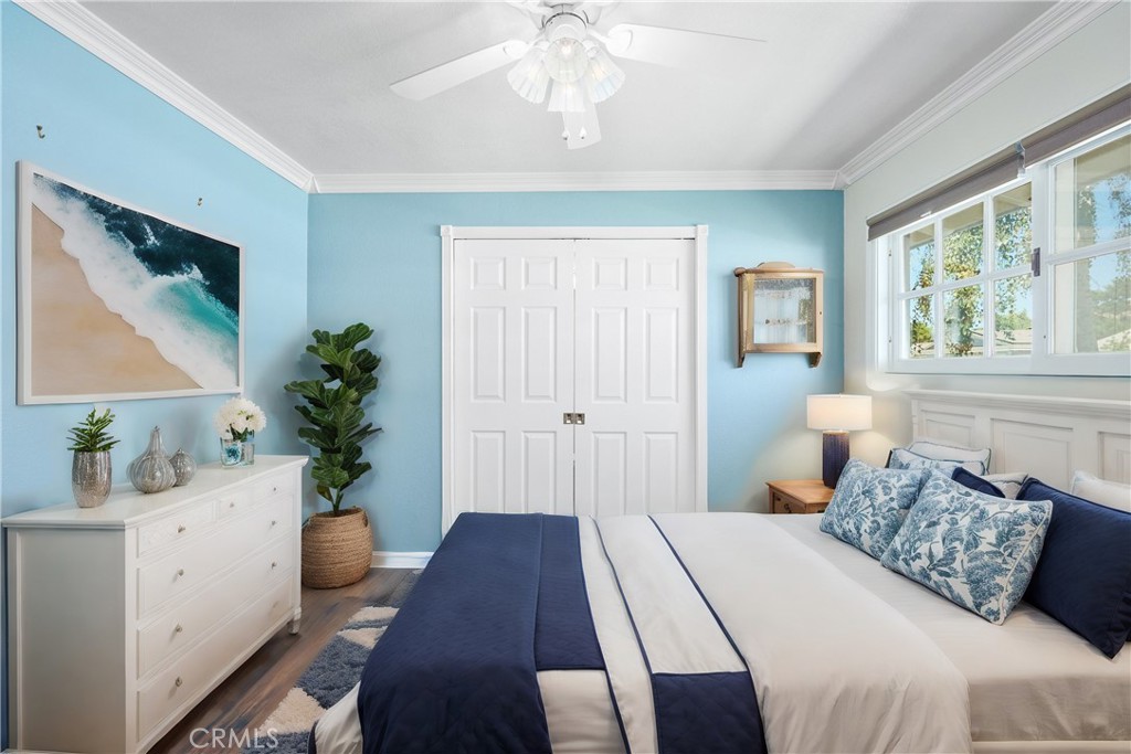 3976 Russ Court Simi Valley, CA 93063 - Photo 15 of 47 a bedroom with a bed and a potted plant