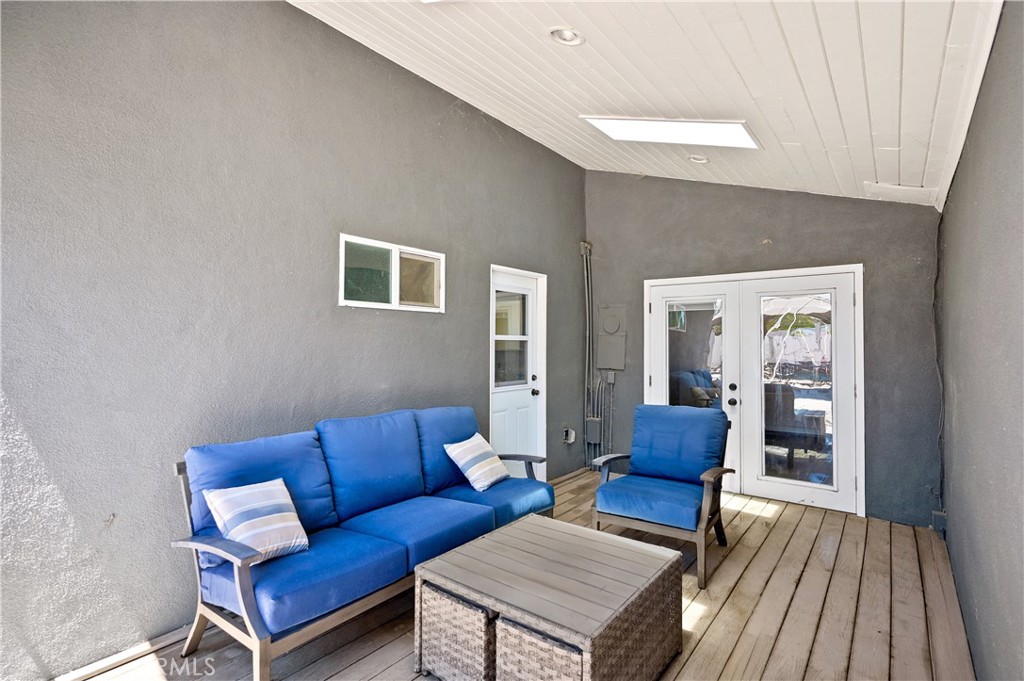 3976 Russ Court Simi Valley, CA 93063 - Photo 35 of 47 a living room with furniture and a wooden floor