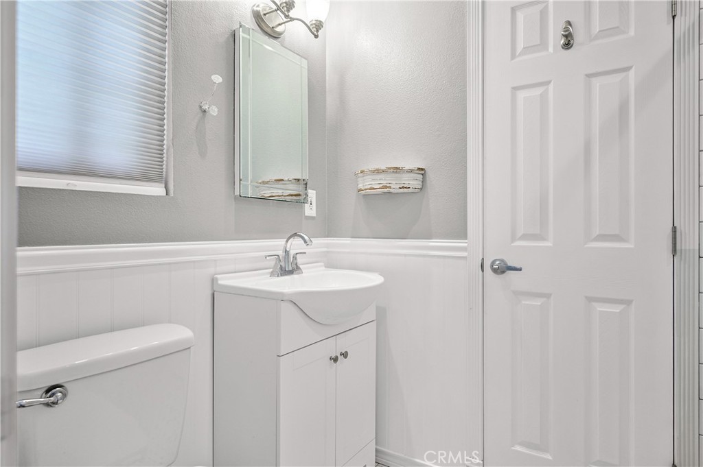 3976 Russ Court Simi Valley, CA 93063 - Photo 10 of 47 a bathroom with a sink toilet and vanity