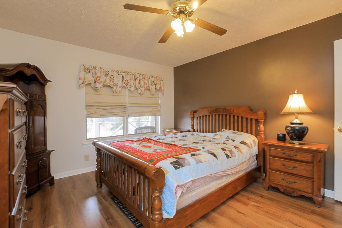 214 South Palmers Chapel Road Cottontown, TN 37048 - Photo 13 of 27 Main level bedroom feels like a bed and breakfast getaway