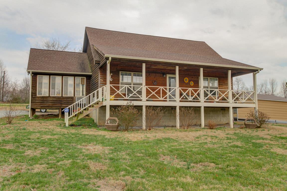 214 South Palmers Chapel Road Cottontown, TN 37048 - Photo 2 of 27 Breezy porch for rest and relaxation