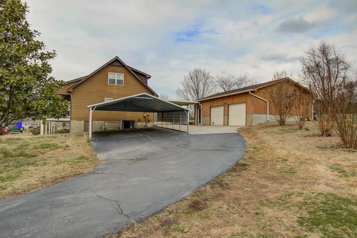 214 South Palmers Chapel Road Cottontown, TN 37048 - Photo 3 of 27 Dual access to dramatic half circle that wraps around the back of house.