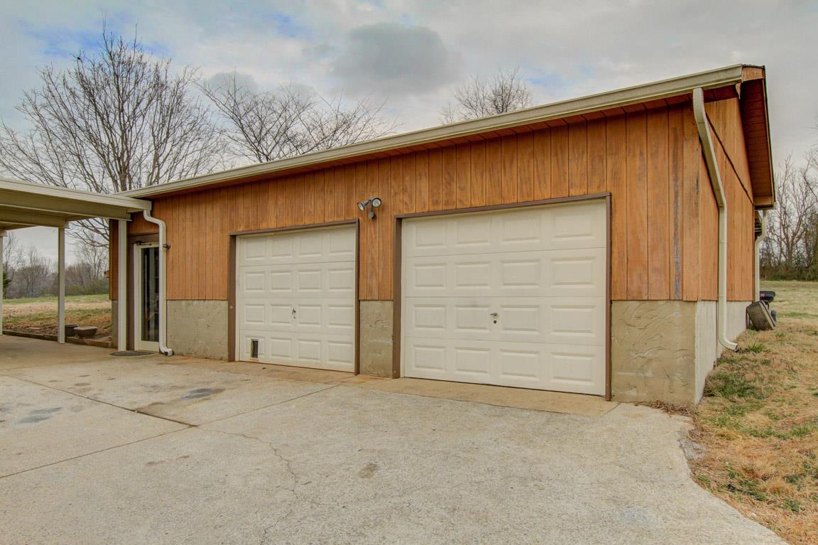 214 South Palmers Chapel Road Cottontown, TN 37048 - Photo 4 of 27 Spacious 2-car detached garage with additional workshop space!