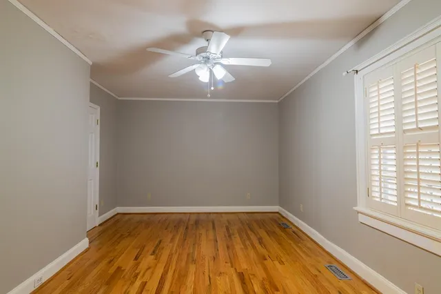 a bathroom with a sink toilet and mirror