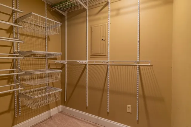 a view of a backyard with wooden fence