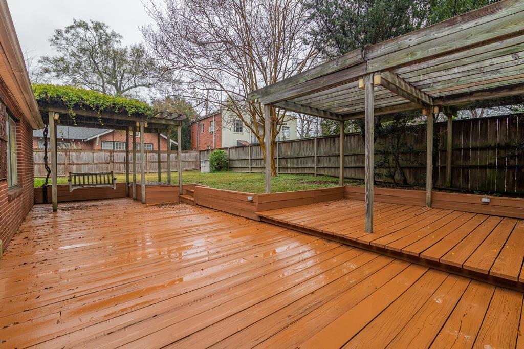 1505 16th Avenue Columbus, GA 31901 - Photo 21 of 22 a view of a backyard with wooden fence
