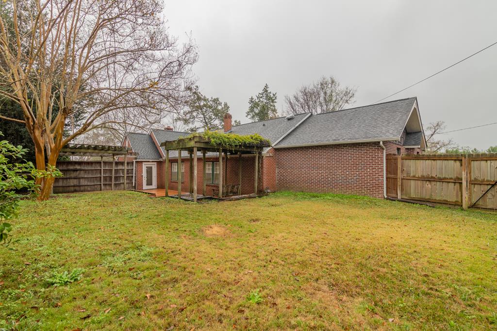 1505 16th Avenue Columbus, GA 31901 - Photo 22 of 22 a view of a house with a yard and garage
