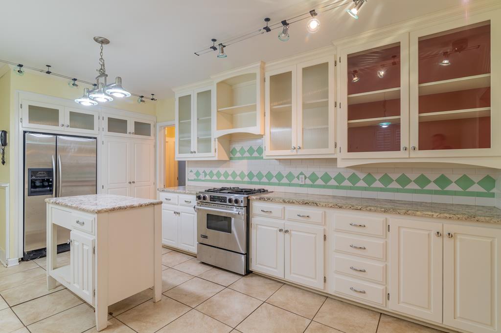 1505 16th Avenue Columbus, GA 31901 - Photo 10 of 22 a kitchen with a sink and stove