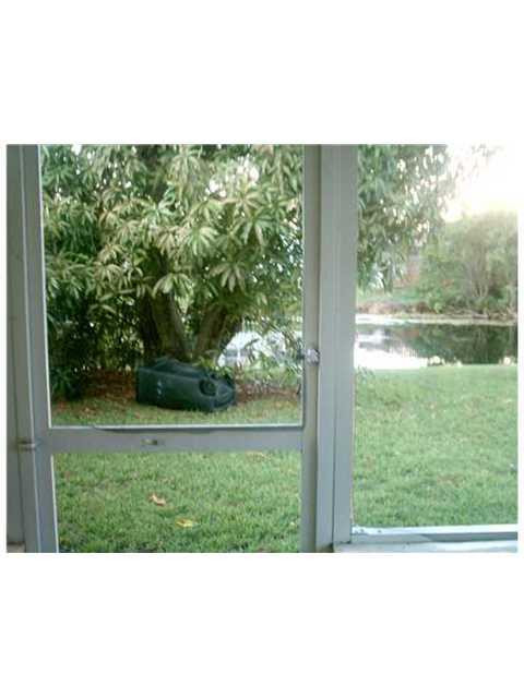 1681 Northwest 60th Avenue, Unit B Sunrise, FL 33313 - Photo 4 of 4 Exterior Back