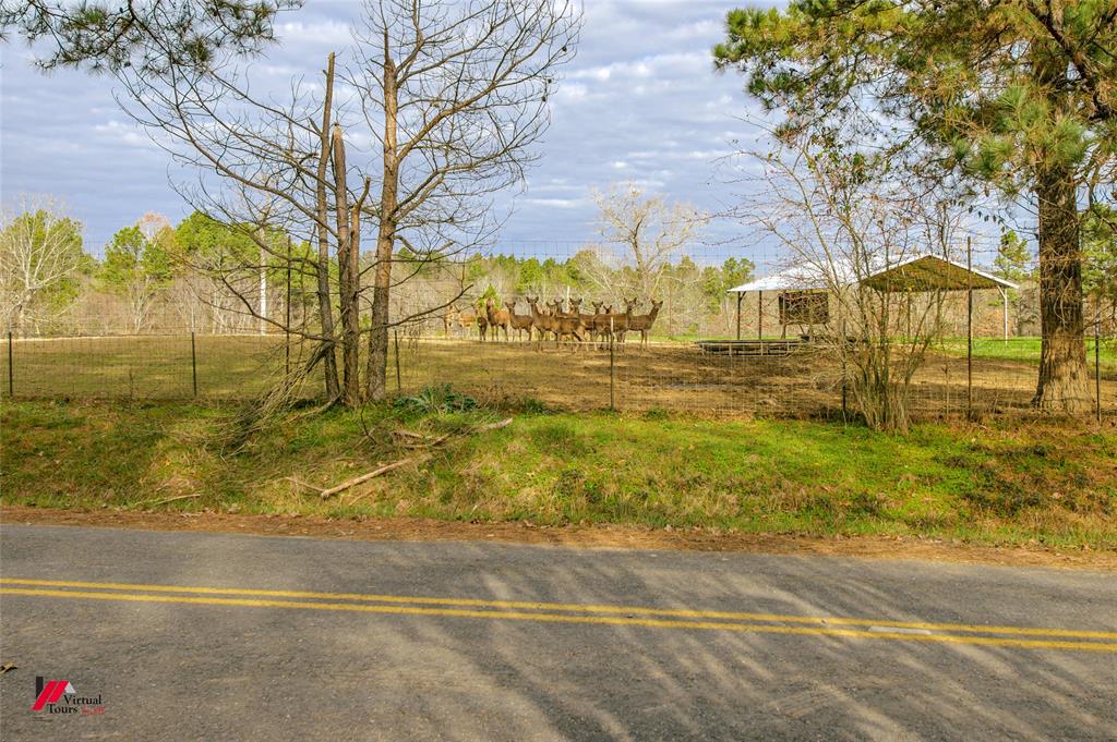 179 Daniel Thomas Road Springhill, LA 71075 - Photo 24 of 37 View of yard featuring a rural view
