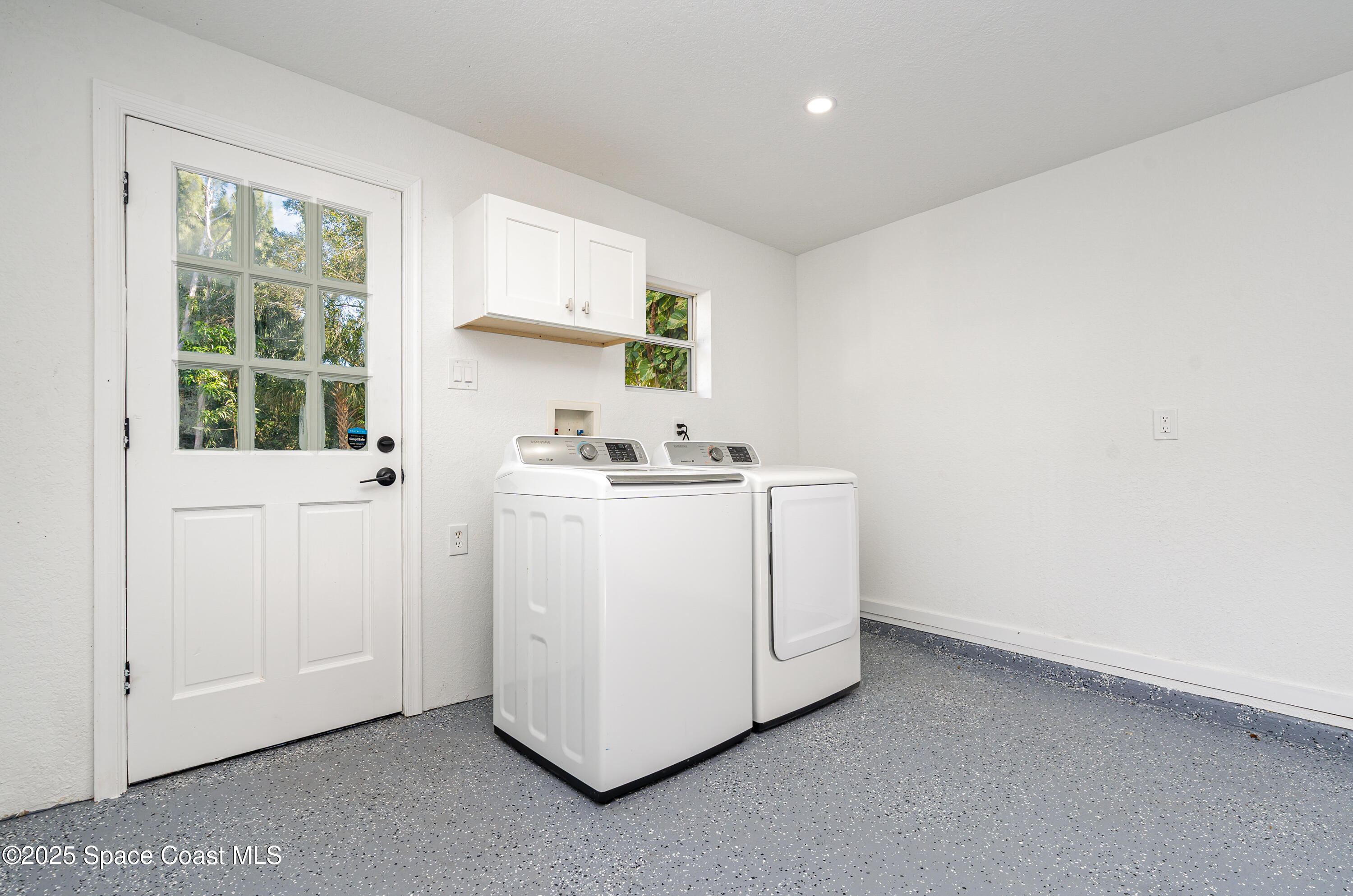 1735 Marywood Road Melbourne, FL 32934 - Photo 21 of 25 a room with storage and utility