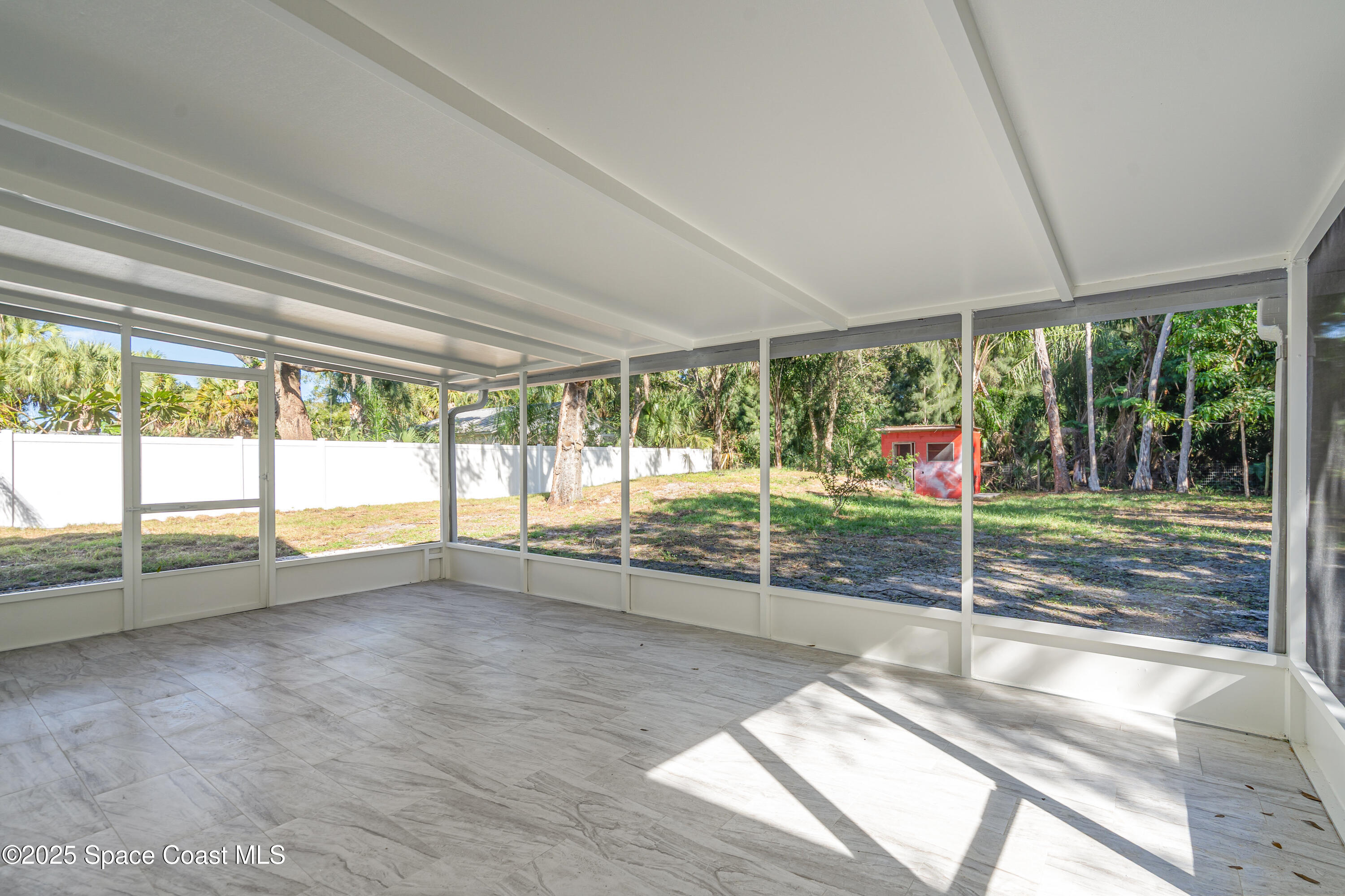 1735 Marywood Road Melbourne, FL 32934 - Photo 22 of 25 a view of empty room with window