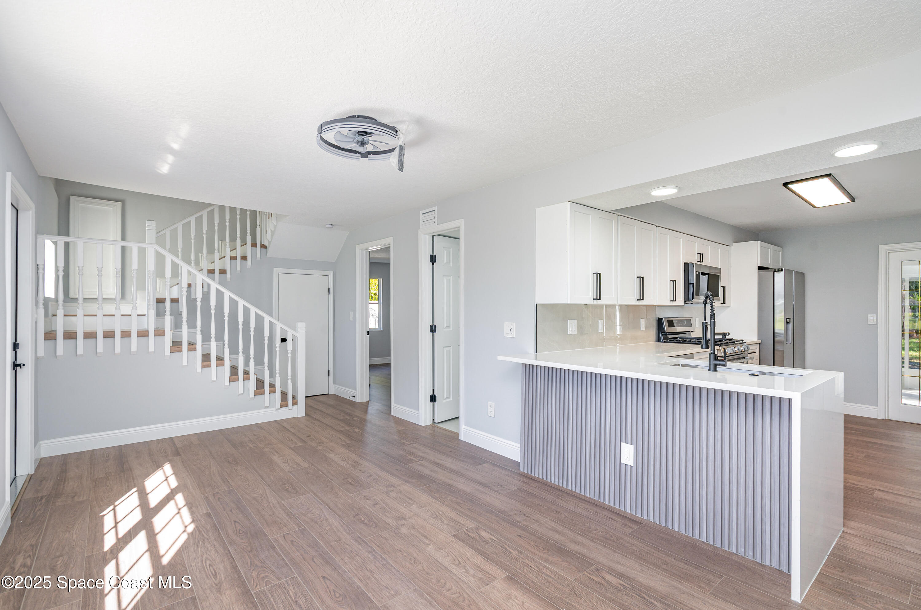 1735 Marywood Road Melbourne, FL 32934 - Photo 6 of 25 a view of a kitchen and a sink