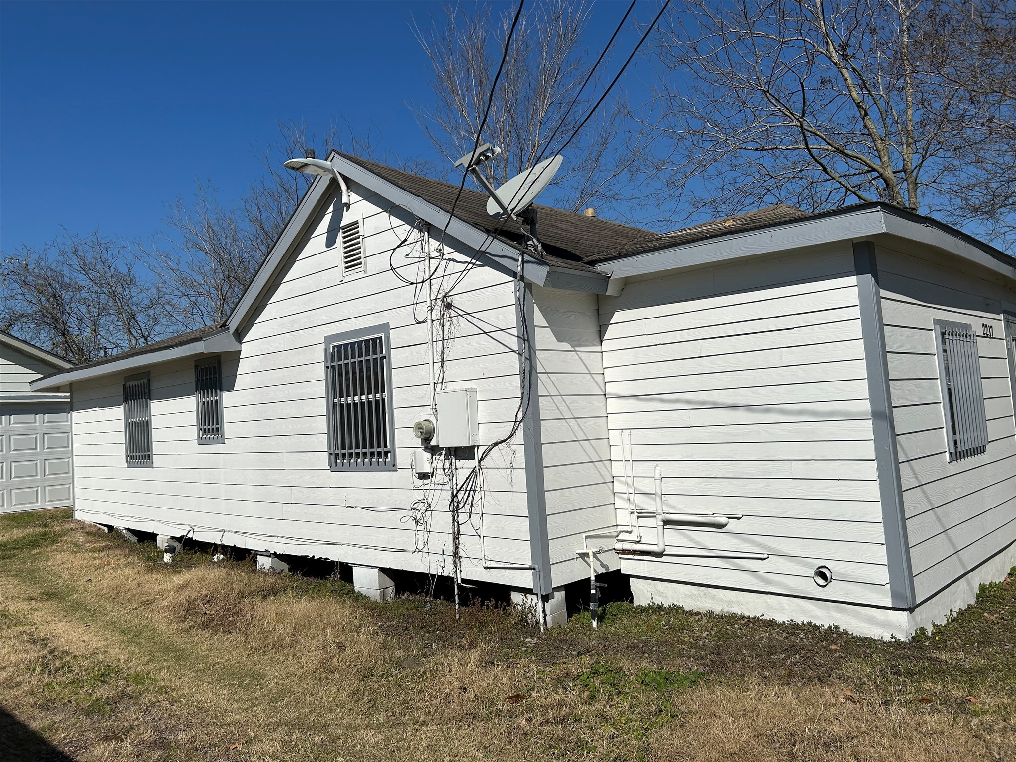 2217 Chew Street Houston, TX 77020 - Photo 2 of 17 a view of a house with a yard