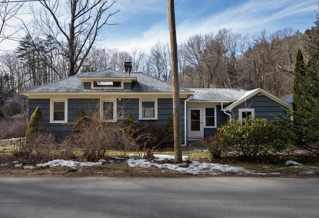 7 Depot Road Williamsburg, MA 01039 - Photo 1 of 29 a front view of a house with yard and trees around