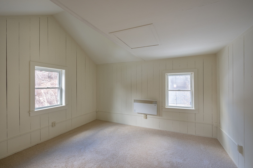 7 Depot Road Williamsburg, MA 01039 - Photo 18 of 29 an empty room with windows