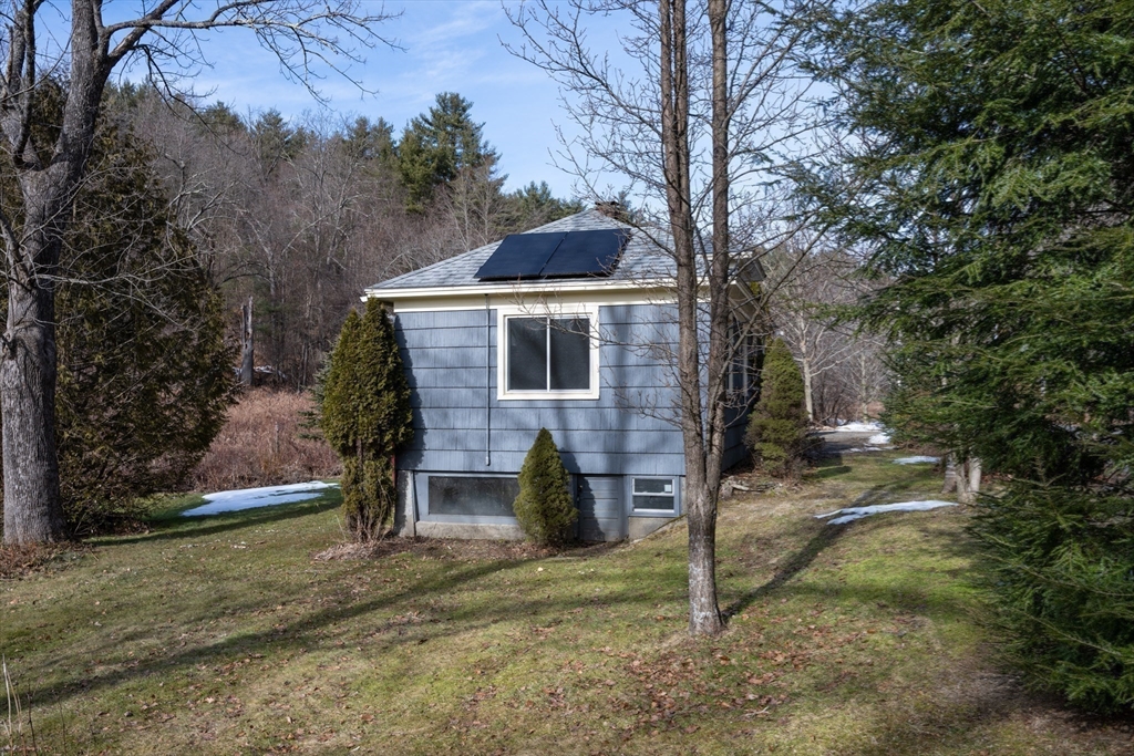 7 Depot Road Williamsburg, MA 01039 - Photo 24 of 29 a front view of a house with garden