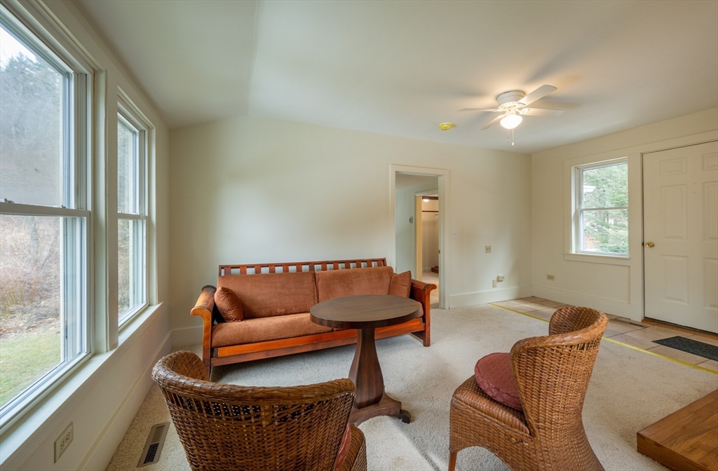 7 Depot Road Williamsburg, MA 01039 - Photo 9 of 29 a living room with furniture and a large window
