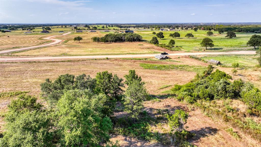 Lot 13-14 Three Quarter Loop Poolville, TX 76487 - Photo 6 of 10 a view of an ocean and a space