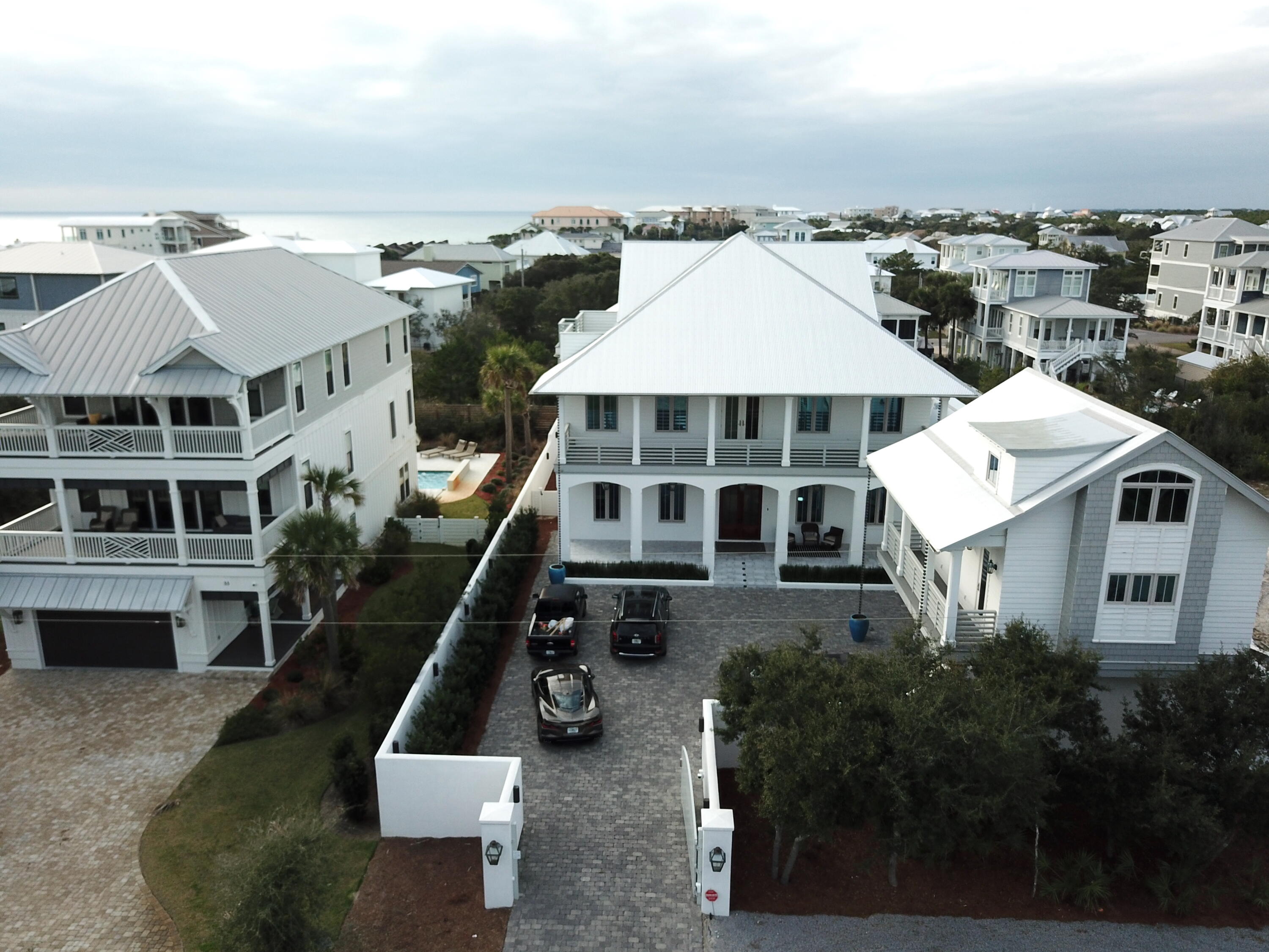 69 Brenda Lane Inlet Beach, FL 32461 - Photo 1 of 46 an aerial view of a house with a yard