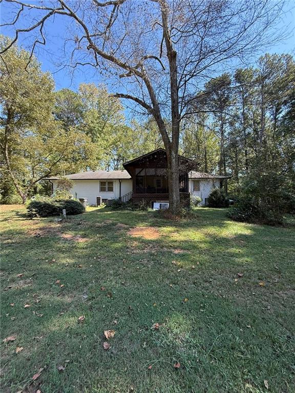 116 Mt Calvary Road Marietta, GA 30064 - Photo 18 of 31 a view of a house with a yard