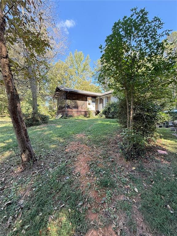 116 Mt Calvary Road Marietta, GA 30064 - Photo 20 of 31 a view of a house with a yard