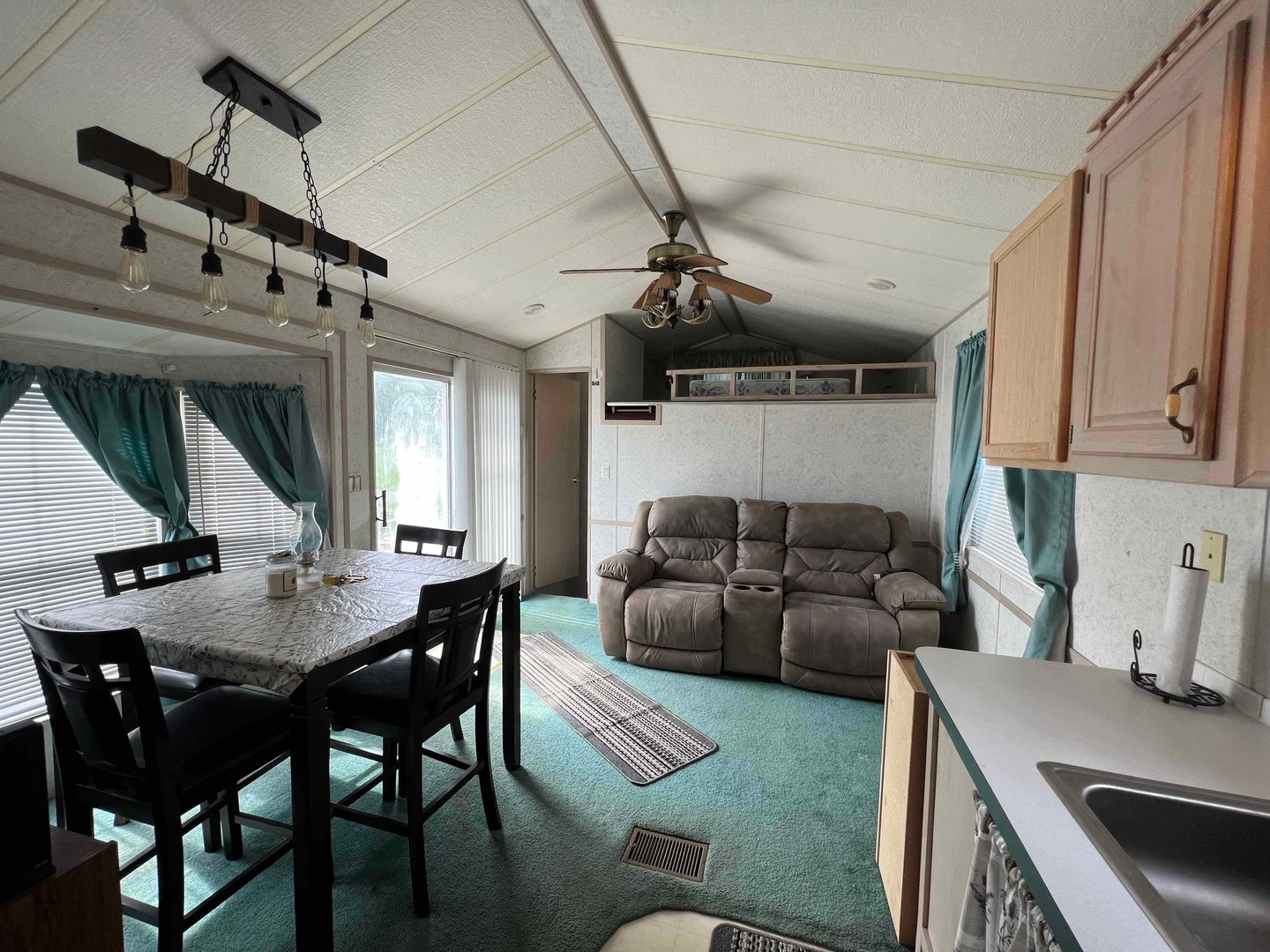 25 Dinosaur Road Wilmington, IL 60481 - Photo 5 of 10 a living room with furniture and a wooden floor