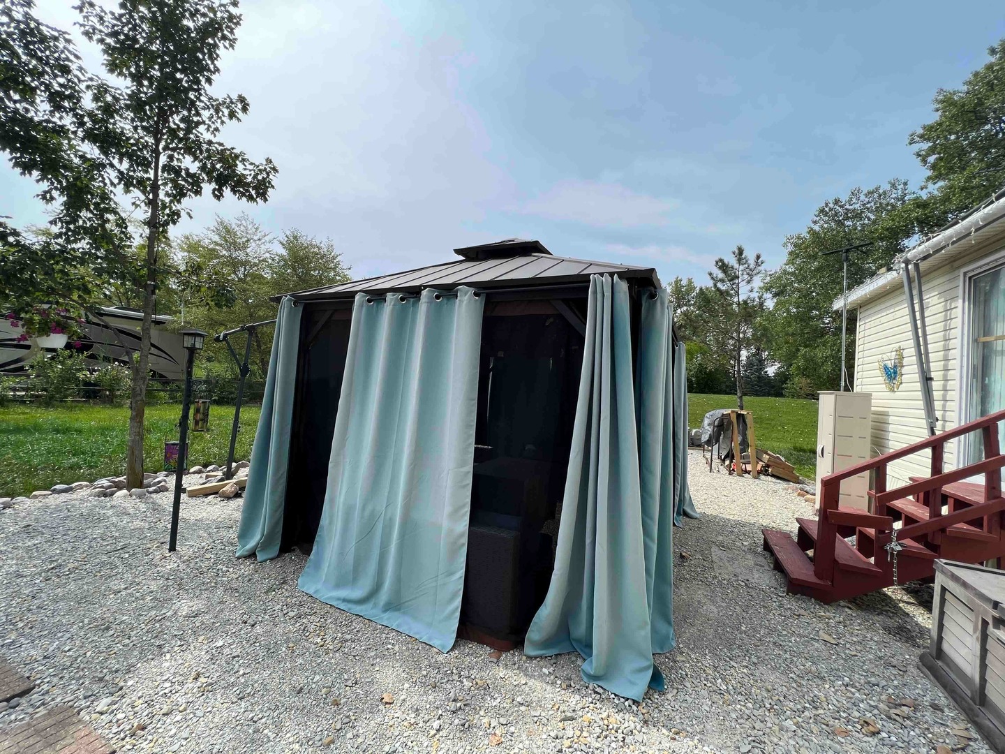 25 Dinosaur Road Wilmington, IL 60481 - Photo 10 of 10 a view of backyard with barbeque grill and wooden fence