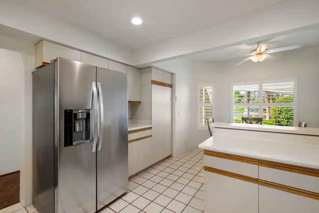 a view of a city with lawn chairs