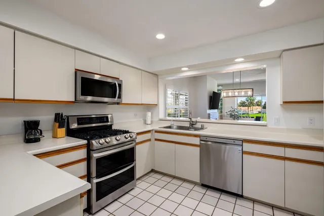 a view of a city with mountains in the background