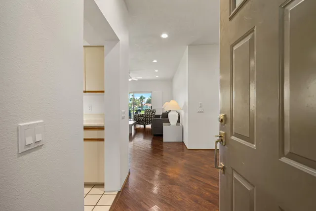 a bathroom with a sink toilet vanity and bathtub